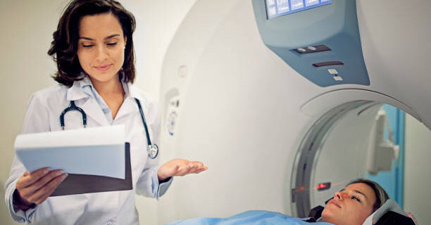 Radiotherapy Centre - doctor looking at the radiotherapy report